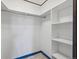 Walk-in closet with built-in shelving providing plenty of storage space at 8822 E Florida Ave # G07, Denver, CO 80247