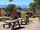 Community playground for children, featuring benches and picnic tables in the area at 8822 E Florida Ave # G07, Denver, CO 80247