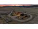 Expansive property featuring a charming rustic home and barn with mountain views in the background at 11524 Spruce Mountain Rd, Larkspur, CO 80118