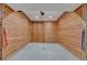 Indoor wash stall features wood paneling and a rubber floor at 11524 Spruce Mountain Rd, Larkspur, CO 80118