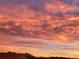 Stunning skyline view at sunset, showcasing vibrant colors and urban architecture, creating a captivating scene at 8475 E 36Th Ave # 337, Denver, CO 80238