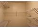 Walk-in closet showing installed wire shelving for storage at 213 Mesa St, Brighton, CO 80601