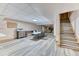 Finished basement includes seating area, home office, and access to other rooms at 5400 S Alkire St, Littleton, CO 80127