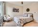 Comfortable bedroom with neutral tones, carpet flooring, and natural light from the window at 9527 Iron Mountain Way, Arvada, CO 80007