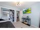 Cozy bedroom features carpeted floors, closet, and a television at 6139 Raleigh Cir, Castle Rock, CO 80104