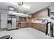 Well-organized garage featuring ample storage cabinets, work space, and room for multiple cars at 6139 Raleigh Cir, Castle Rock, CO 80104