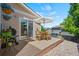 Inviting outdoor patio features a dining set with umbrella, perfect for enjoying meals and entertaining guests at 6139 Raleigh Cir, Castle Rock, CO 80104