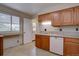 Bright kitchen area with a sink and window at 4391 W Tufts Ave, Denver, CO 80236
