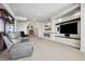 Basement with a fireplace, theater and entertainment area, perfect for relaxing and watching movies at 2937 Hidden Den Ct, Franktown, CO 80116