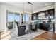 Dining room featuring hardwood floors, modern lighting fixture, and scenic views at 2937 Hidden Den Ct, Franktown, CO 80116