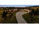 Beautiful home with a long concrete driveway and an attached two-car garage at 2937 Hidden Den Ct, Franktown, CO 80116