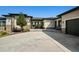 Exterior of home with stone accents, covered entry, and rocking chairs on the porch at 2937 Hidden Den Ct, Franktown, CO 80116