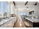 Beautiful kitchen with stainless steel appliances, granite countertops and hardwood floors at 2937 Hidden Den Ct, Franktown, CO 80116