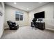 Home office featuring a large window, modern desk setup and comfortable chair at 2937 Hidden Den Ct, Franktown, CO 80116