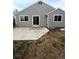 The backyard features a concrete patio with sliding glass door access from the house at 2242 S Uravan St, Aurora, CO 80013