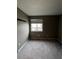 A bedroom with neutral carpeting and natural lighting at 2242 S Uravan St, Aurora, CO 80013