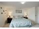 Well-lit bedroom with a comfortable bed, soft pillows, and a soothing ambiance at 4673 Perth St, Denver, CO 80249