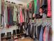 Organized walk-in closet with ample space for clothing, shoes, and accessories at 4673 Perth St, Denver, CO 80249