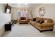 Cozy living room with plush seating, large windows, and modern decor at 4673 Perth St, Denver, CO 80249