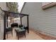 Back patio with pergola features comfortable seating, a grill, and a relaxing outdoor space at 4673 Perth St, Denver, CO 80249