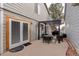 Outdoor patio with pergola featuring stylish seating and a grill, perfect for entertaining at 4673 Perth St, Denver, CO 80249
