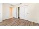 Bedroom boasts wood floors, closet, and neutral color scheme at 5725 W 91St Ave, Westminster, CO 80031