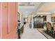 Elegant foyer featuring tile floors, a grand staircase, and tasteful decor leading to the living areas at 10776 Hillsboro Cir, Parker, CO 80134