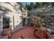 Back deck with seating, perfect for enjoying the natural scenery at 900 Sawmill Creek Rd, Evergreen, CO 80439