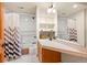 Full bathroom with shower-tub, neutral tiles, vanity and updated fixtures at 900 Sawmill Creek Rd, Evergreen, CO 80439