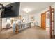 Relaxing main bedroom boasts a log bed frame, neutral decor, and convenient side tables with lamps at 900 Sawmill Creek Rd, Evergreen, CO 80439