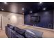 Finished basement media room with a large TV, comfortable seating, and a cozy atmosphere at 1751 Clermont St, Denver, CO 80220