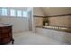 A luxurious bathroom features a soaking tub and marble vanity at 1751 Clermont St, Denver, CO 80220