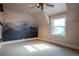 A bright bedroom with modern decor and mountain wall art at 1751 Clermont St, Denver, CO 80220