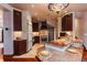 Bright kitchen with granite countertops, stainless steel appliances, and custom cabinetry at 1751 Clermont St, Denver, CO 80220