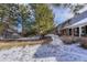 Sidewalk next to a row of houses with snow on the ground at 8621 E Yale Ave # F, Denver, CO 80231