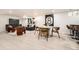 Finished basement with stylish furniture, bar seating, and a modern aesthetic for entertaining and relaxation at 4055 S Niagara Way, Denver, CO 80237