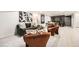 Finished basement with a modern sitting area, sofa, and kitchenette at 4055 S Niagara Way, Denver, CO 80237