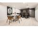 Finished basement featuring modern bar and dining area at 4055 S Niagara Way, Denver, CO 80237