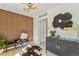 Stylish entryway with wood accent wall and decorative elements creating a welcoming ambiance at 4055 S Niagara Way, Denver, CO 80237