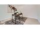 Cozy home office featuring a stylish desk, decor, and a patterned rug at 4055 S Niagara Way, Denver, CO 80237