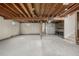 Unfinished basement featuring concrete floor, exposed beams and lots of potential at 8025 S Cody St, Littleton, CO 80128