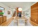 Spacious dining room offering ample seating, natural light, and a seamless flow into the kitchen area at 1452 S Washington St, Denver, CO 80210