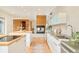 Spacious kitchen with concrete counters, butcher block island and modern gas fireplace at 1452 S Washington St, Denver, CO 80210