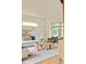 Cozy living room with neutral tones, modern furniture, and ample natural light at 1452 S Washington St, Denver, CO 80210