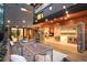 Inviting backyard patio area with a long dining table and seamless indoor-outdoor flow to the interior at 1452 S Washington St, Denver, CO 80210