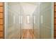 Contemporary walk-in closet with custom shelving and storage, offering ample space at 1452 S Washington St, Denver, CO 80210