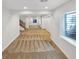Spacious finished basement with neutral carpeting and great natural light from the window at 2180 Trailblazer Way, Castle Rock, CO 80109