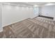 Finished basement with neutral carpet and recessed lighting, perfect for entertaining at 2180 Trailblazer Way, Castle Rock, CO 80109
