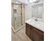 Updated bathroom featuring a glass enclosed shower and modern vanity at 2180 Trailblazer Way, Castle Rock, CO 80109