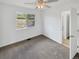 Bedroom features carpet, and a window with view of the outside landscape at 2180 Trailblazer Way, Castle Rock, CO 80109